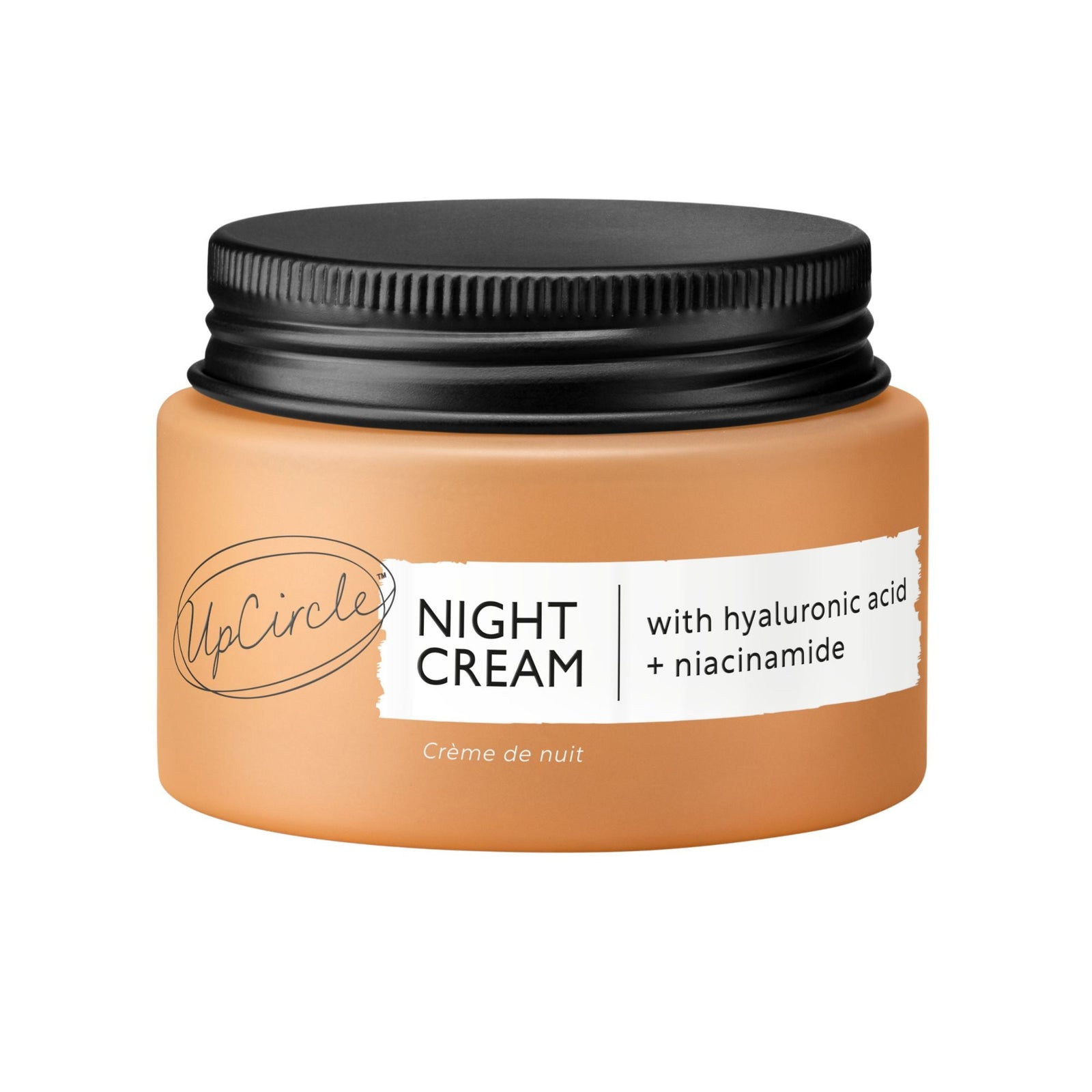 Jar of UpCircle night cream with a black lid on a white background